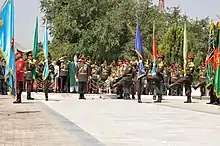 Image 44President Hamid Karzai observing the honor guard of the Afghan armed forces during the 2011 Afghan Independence Day. (from Culture of Afghanistan)