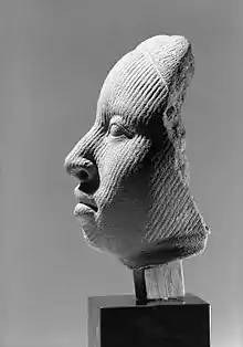 Image 16A terra-cotta head sculpture (1100-1500) of the Yoruba, showing extraordinary naturalism. This head represents the oni or king of Ife. (from Culture of Africa)