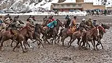 Image 46Players in a game of buzkashi, the national sport (from Culture of Afghanistan)