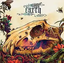 A lion's skull in profile.  There is honeycomb in its eye socket and bees swarm around it.