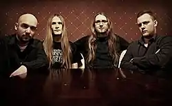 Official photo of a band, 2015. From left to right: Michal Vlkovic, Jakub Filip, Tomas Cvecka and Robert Ruman.