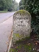 The other side of the same mile stone in Holt.