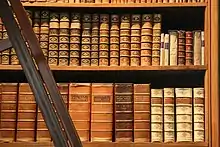 a bookshelf full of books