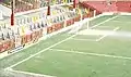 Stretford End of Old Trafford in Manchester (1992). In soccer, the goal line is the boundary of the smaller rectangle that touches the goal as seen in the picture.