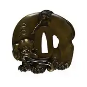 Tsuba with a Monkey Teasing an Elephant with a Stick, The Walters Art Museum.