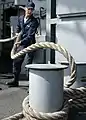 A man holding a rope.